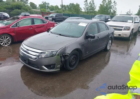 2010 Ford Fusion Hybrid z USA, uszkodzony, nr VIN 3FADP0L37AR242651